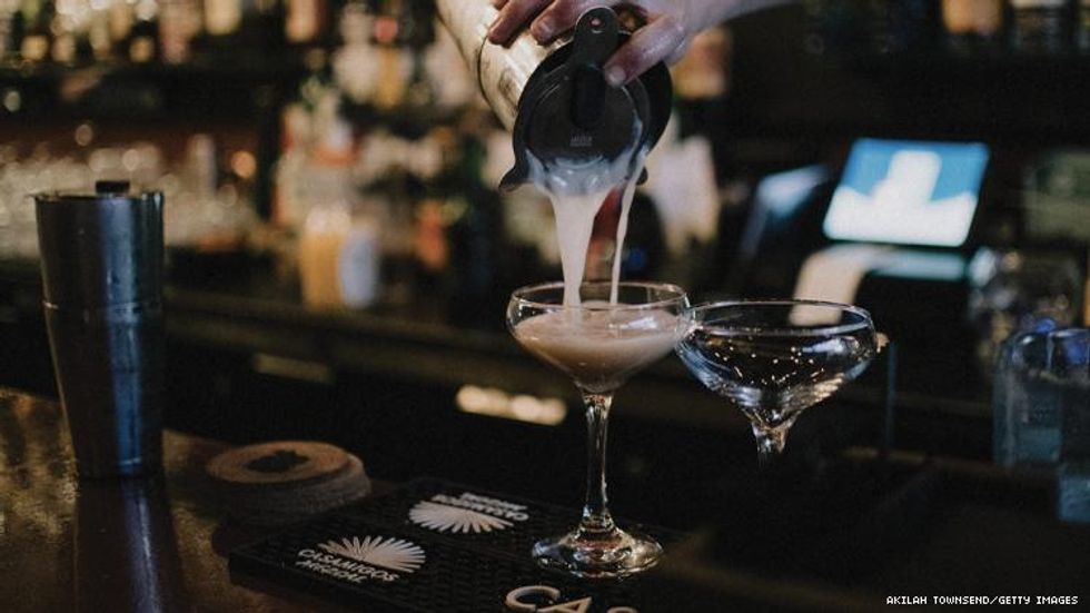 A cocktail being poured at Nobody's Darling bar
