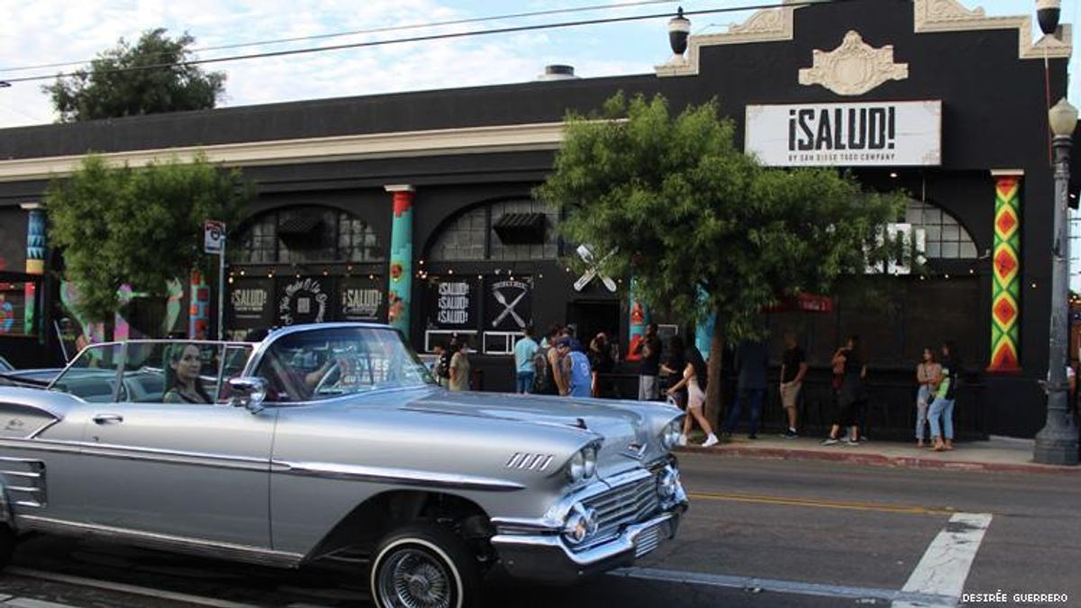 A lowrider in front of Salud! in San Diego's Barrio Logan