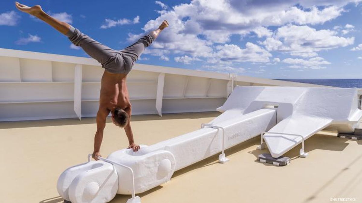A man does upside down splits on a cruise ship