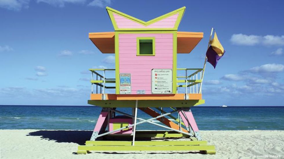 A pink and green lifeguard tower on Miami Beach