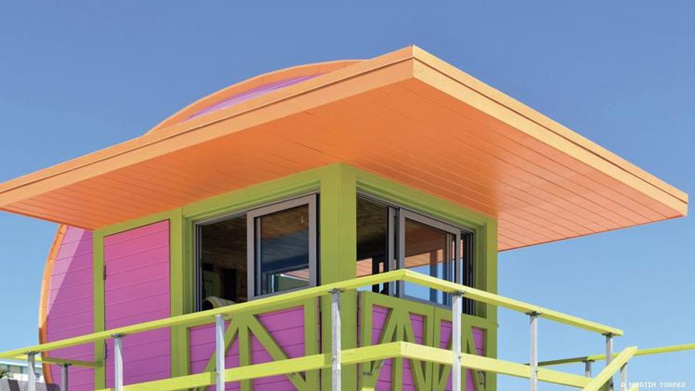 A pink and orange lifeguard shack on Miami Beach