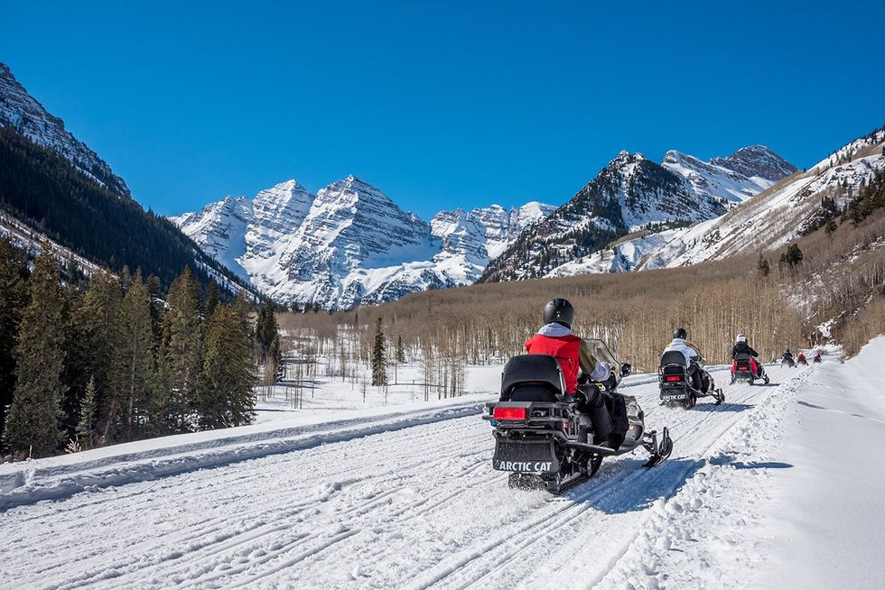 A snowmobile tour through the Colorado Rockies near Aspen with T-Lazy-7 guided snowmobile tours