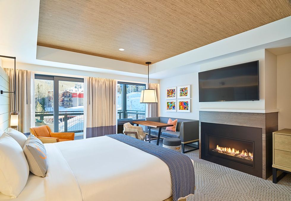 A suite with a fireplace at The Little Nell in Aspen, Colorado