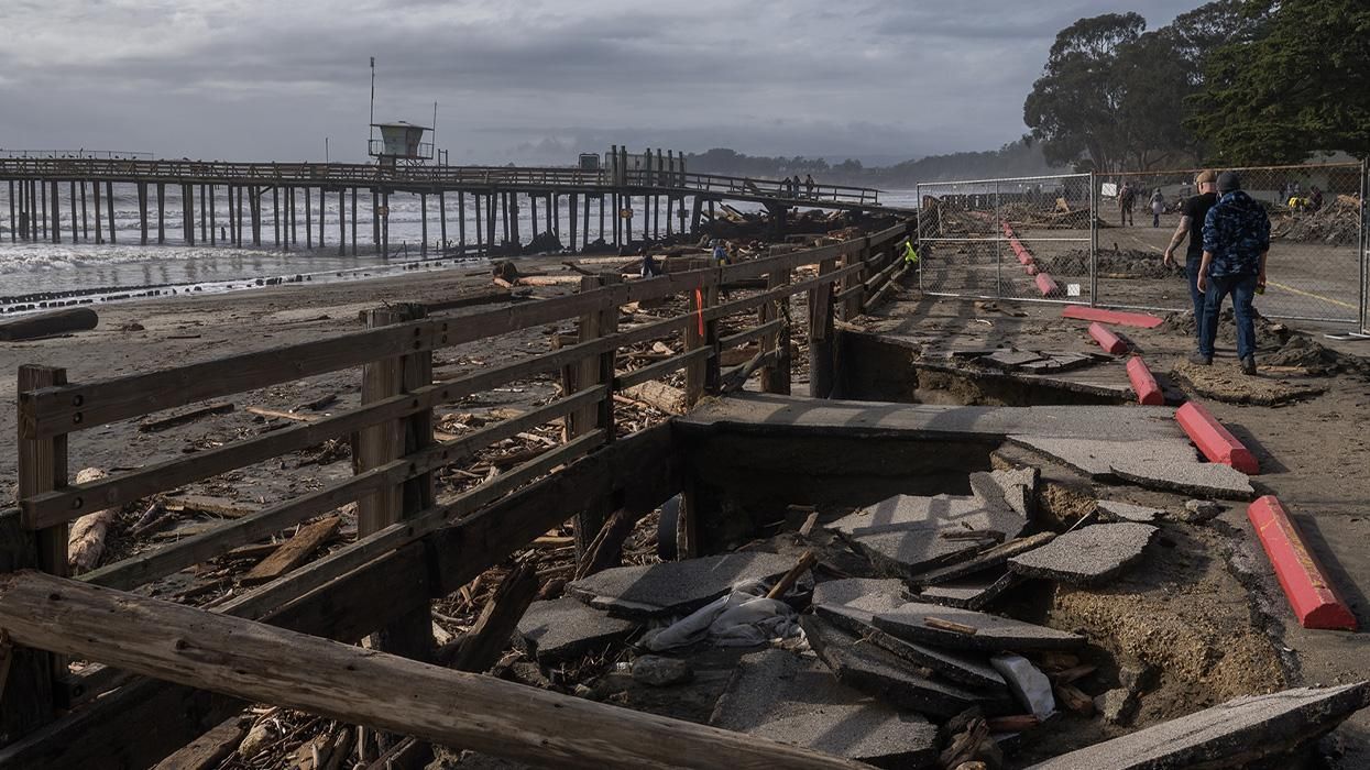 A sunken section of a parking lot after a rain storm at Seacliff State Beach in Aptos, California,