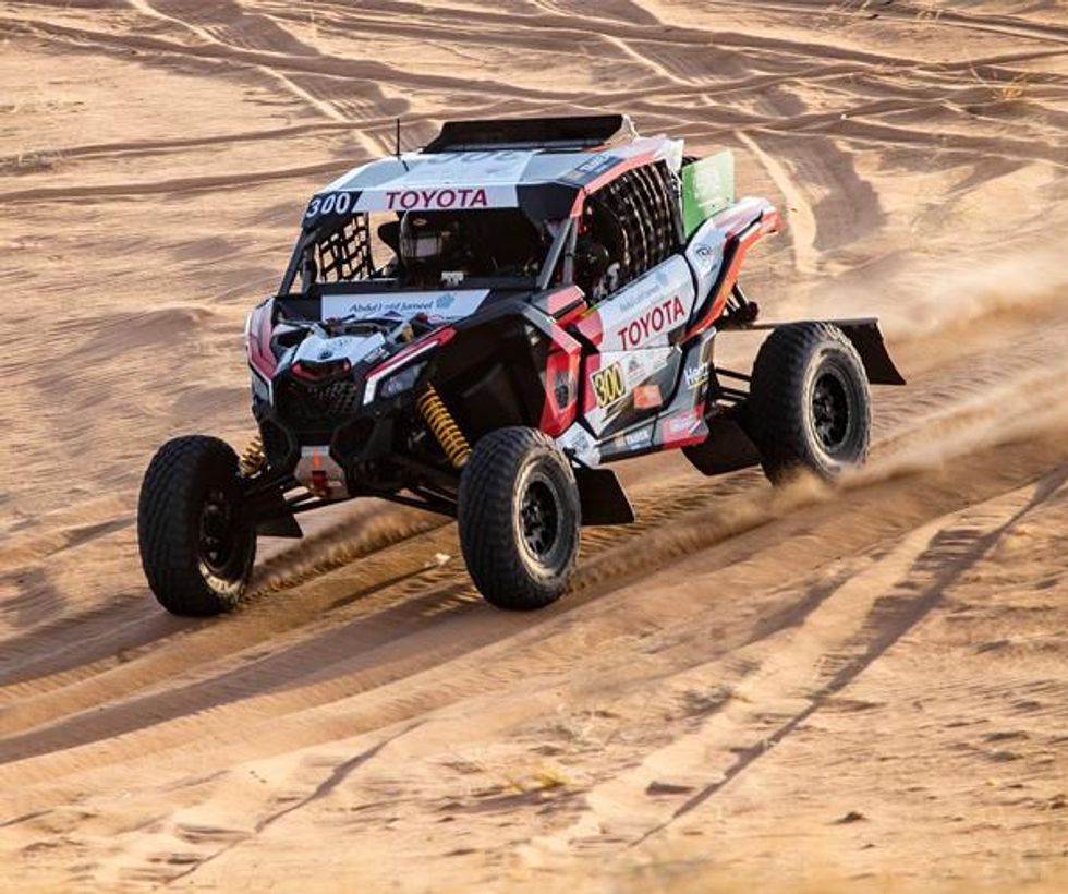 Akeel drives a Can-Am UTV,