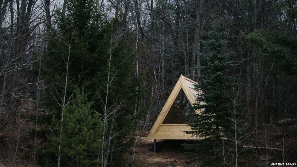 An A-frame cabin in the woods