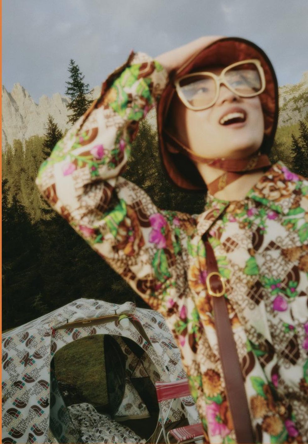 Asian American model North Face x Gucci with tent in background
