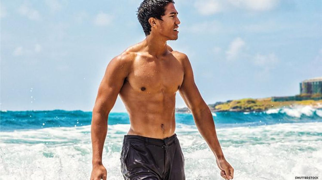 Asian man on Hawaiian beach