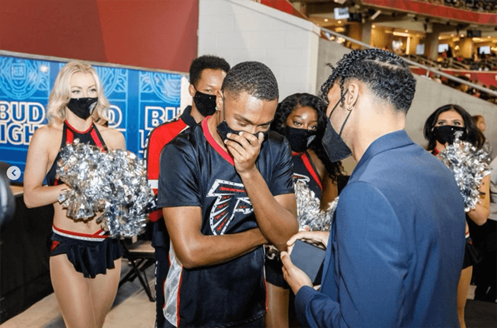 Atlanta Falcons Cheerleader Receives Surprise Wedding Proposal. Spoiler Alert: He Said yes!