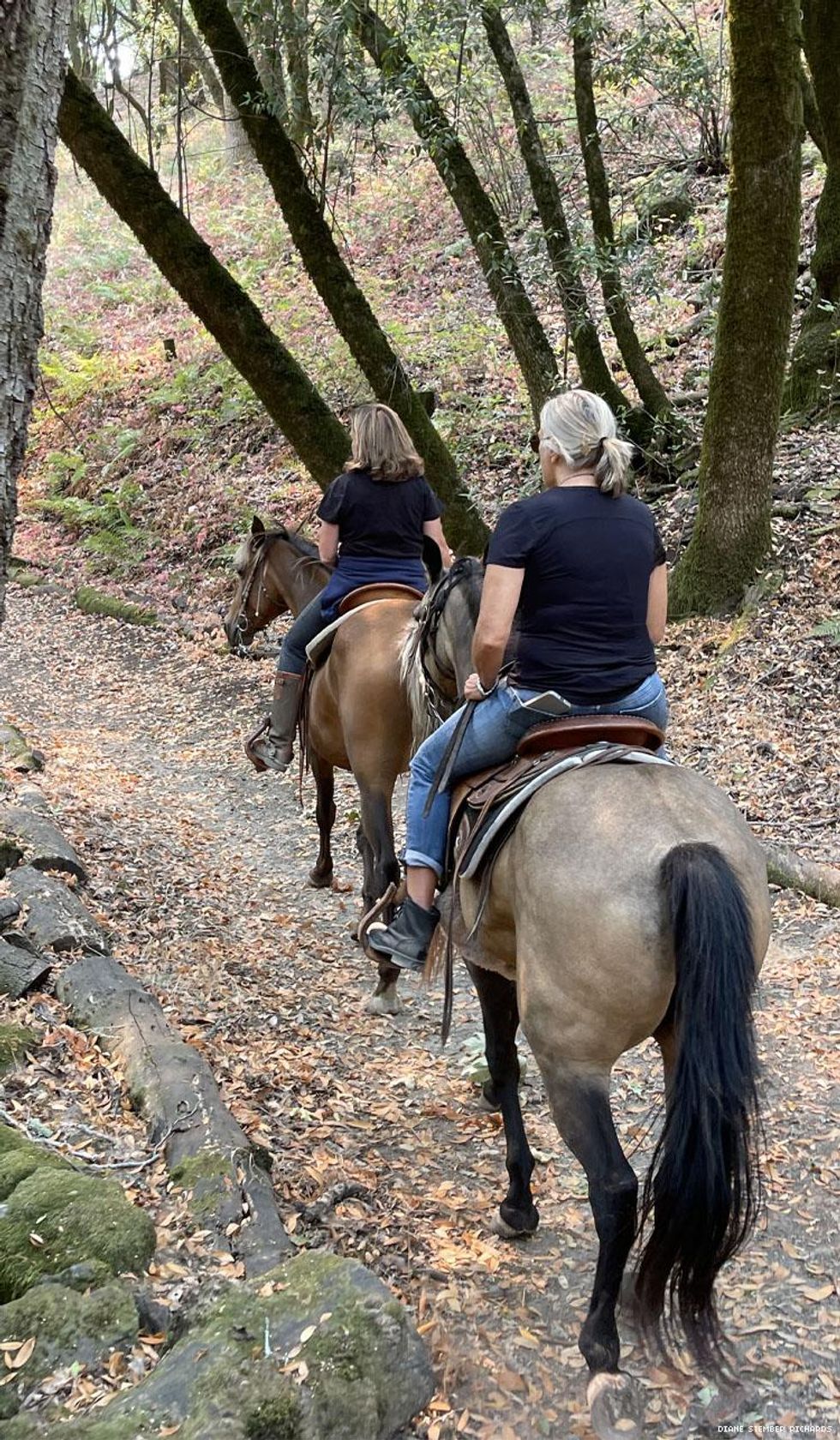 Author Robin Lowey and The Dinah founder Mariah Hanson on horseback