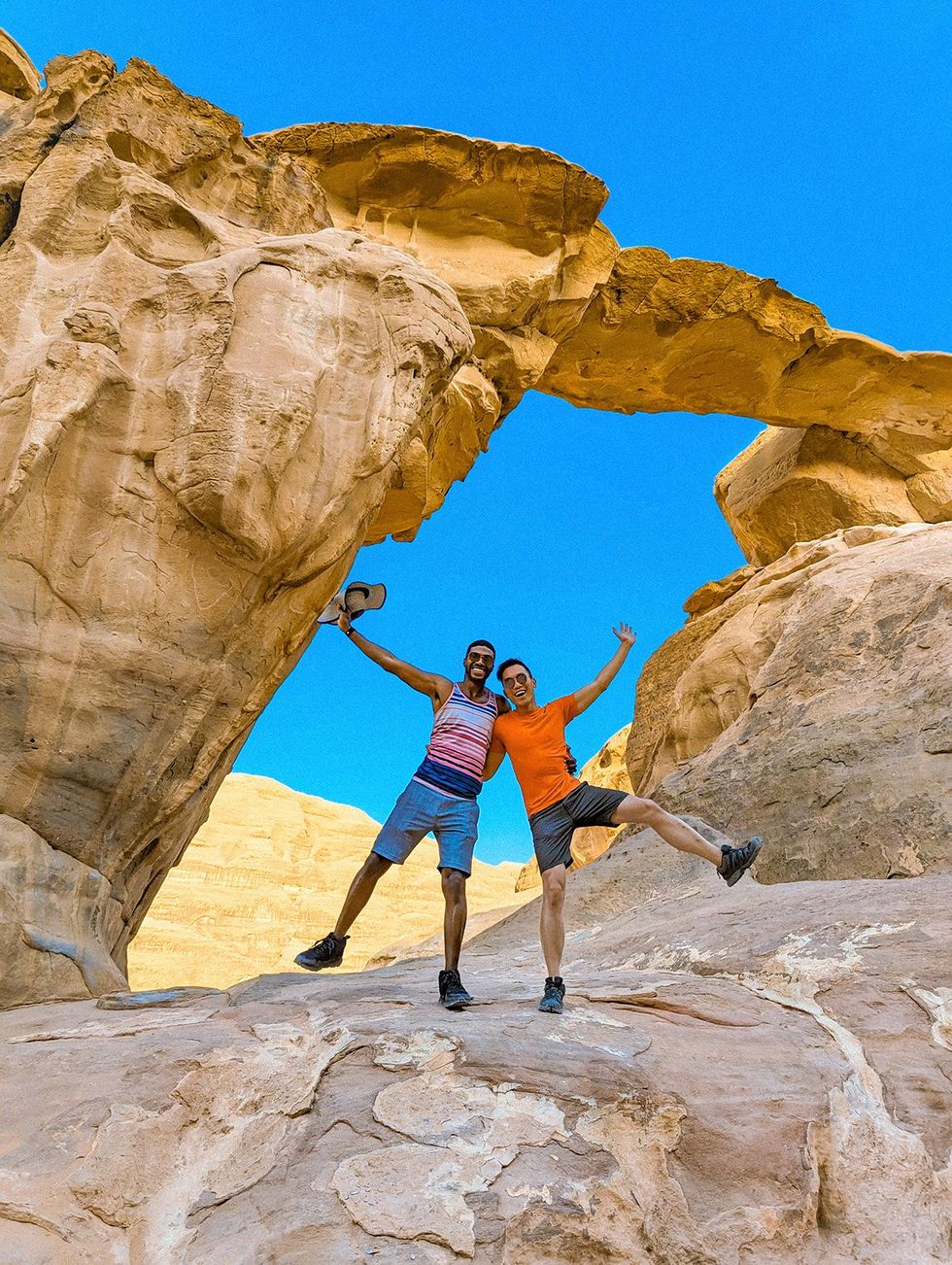 Barry Hoy's LGBTQ+ Syrian Adventure - Barry and Teraj at the Burdah Rock Bridge in the Wadi Rum