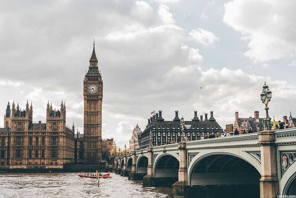Big Ben and the Houses of Parliament overlook the Thames River in London, England, United Kingdom.