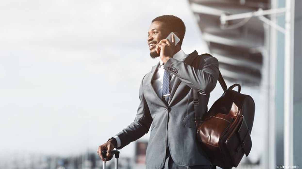 Black business man traveling