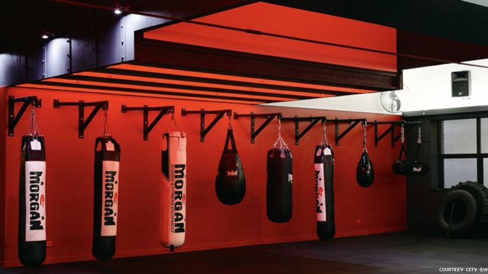 Boxing bags hang at City Gym