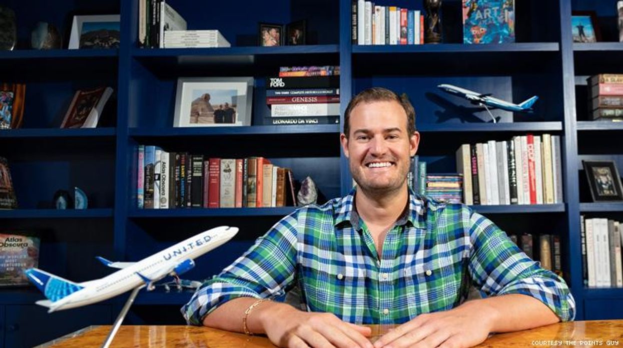 Brain Kelly The Points Guy behind desk