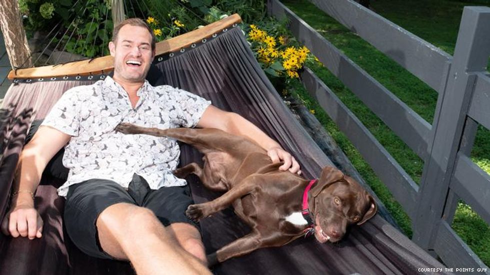 Brian Kelly, The Points Guy with his dog