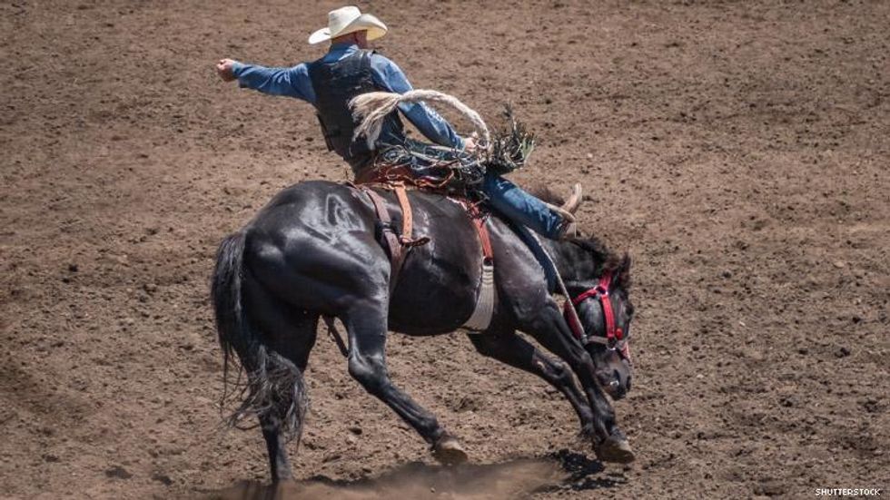 Bronco riding at rodeo