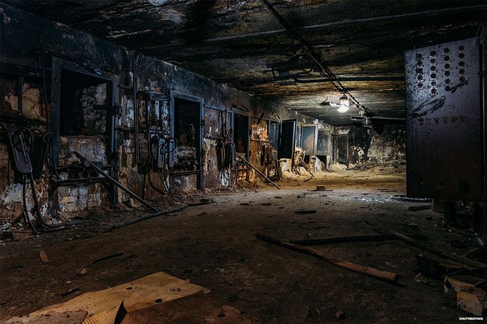 Burnt interior of industrial building basement.