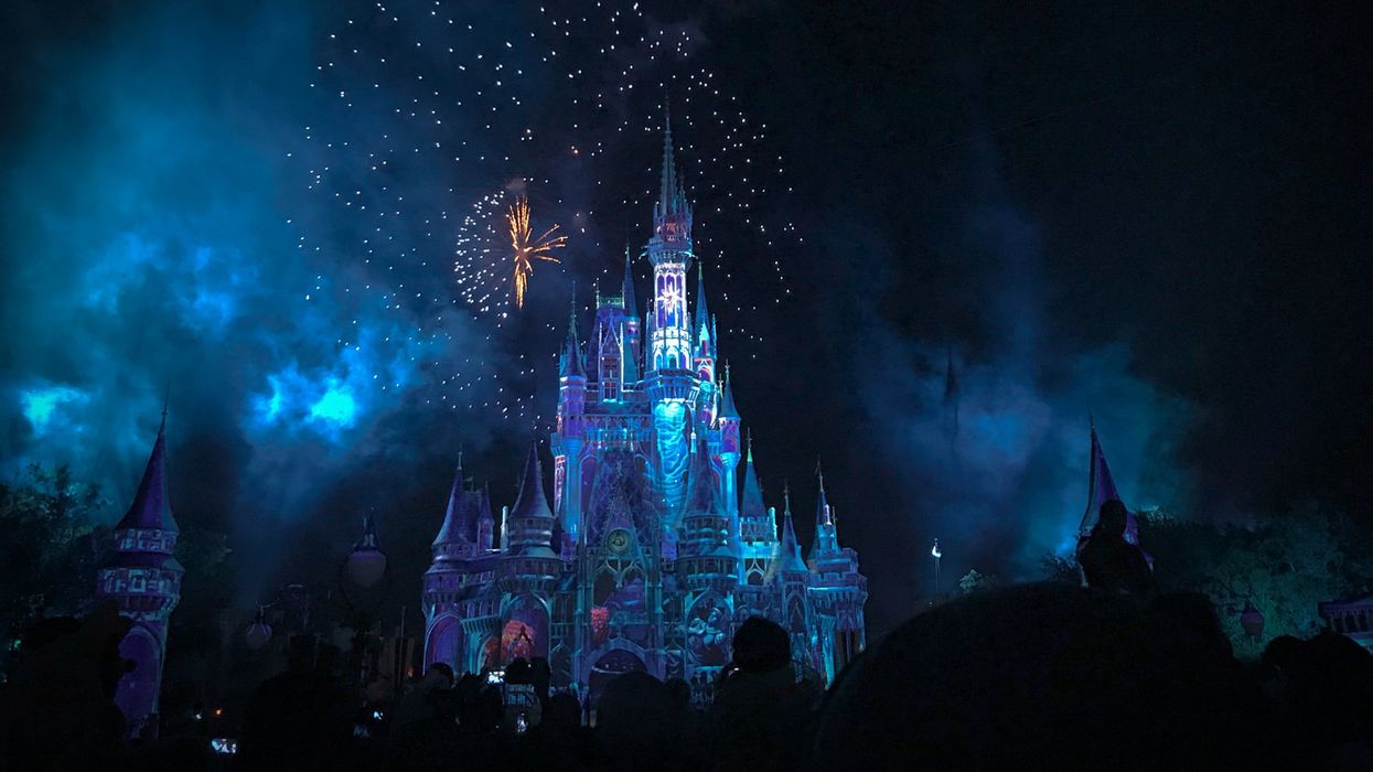 crystal castle with fireworks at night