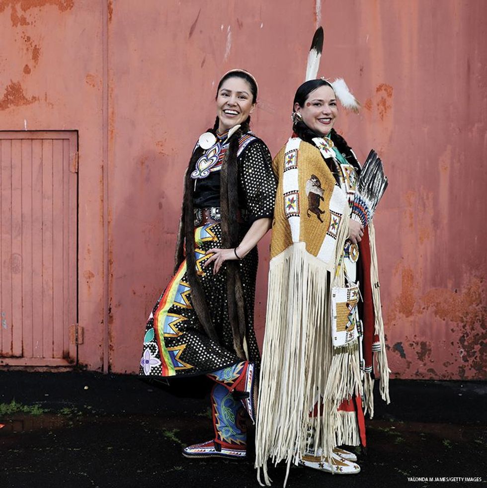 Dauwila Harrison (left), of the Din, Pomo, and Paiute tribes, and Teresa Littlebird, of the Northern Cheyenne tribe, pose during the Two-Spirit Powwow in San Francisco, hosted by the Bay Area American Indian Two-Spirits