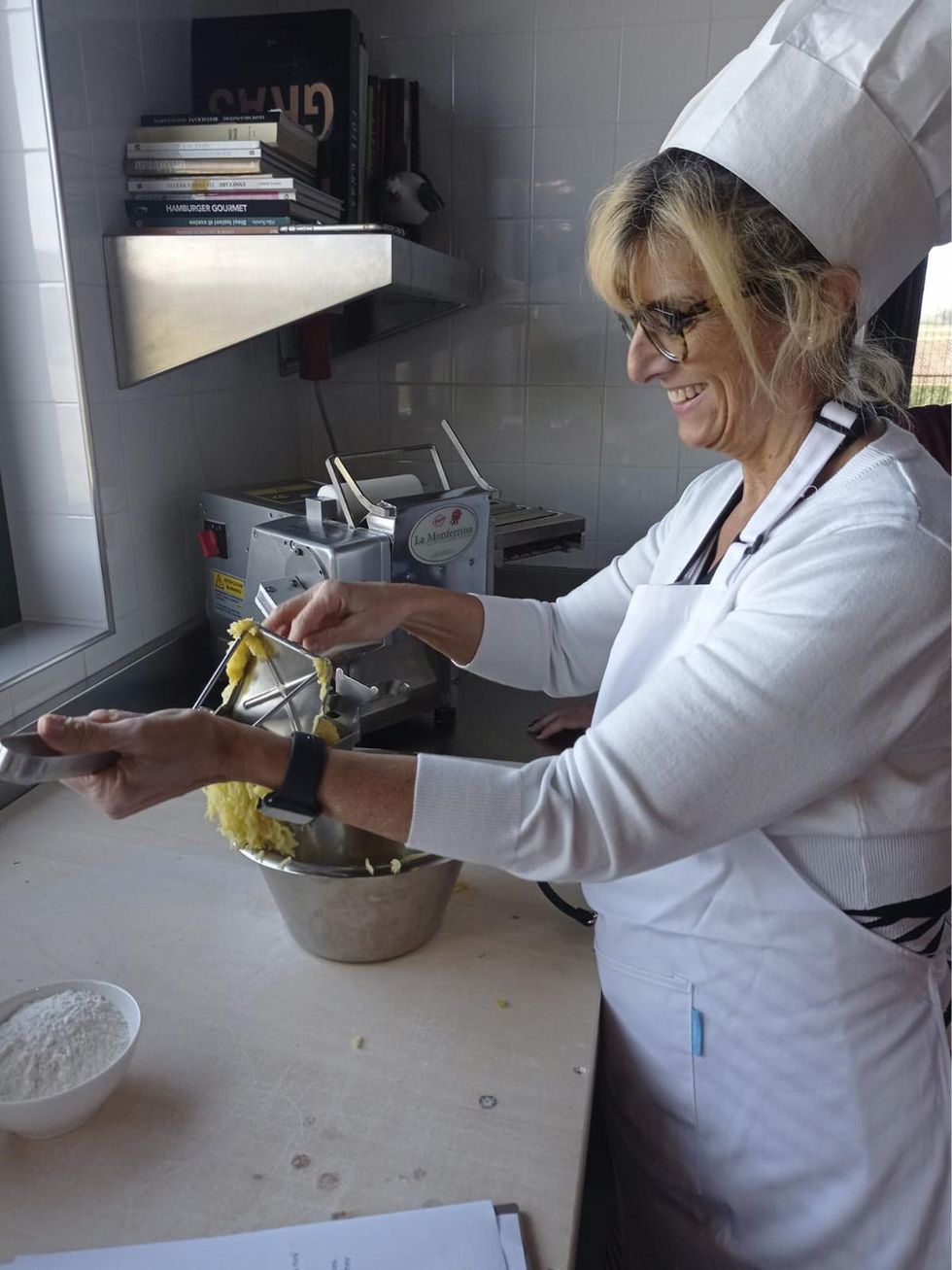 Diane Anderson-Minshall cooking in Italy