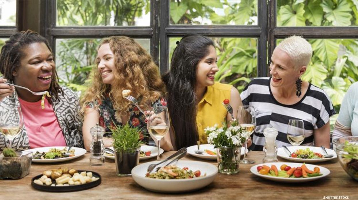 Diverse group of women eating at a restaurant