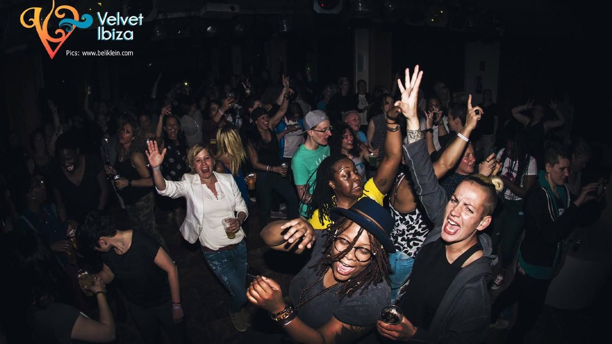 diverse mix of women dancing at night at Velvet Ibiza party