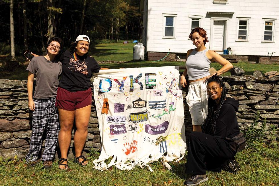 four women participating an lgbtq summer camp called dyke camp