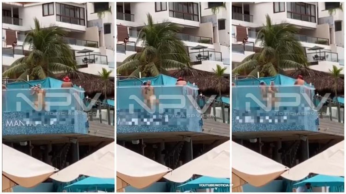 Gay couple having sex in see through pool. image blurred