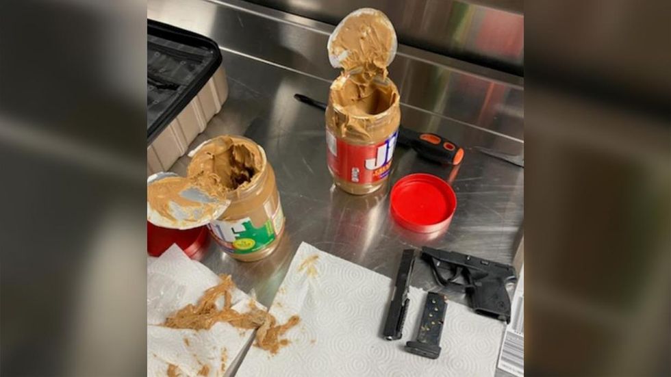 Gun was found in peanut butter jars