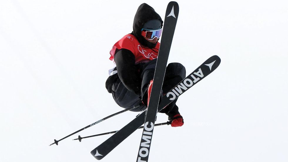 Gus Kenworthy in the air at the 2020 Olympics