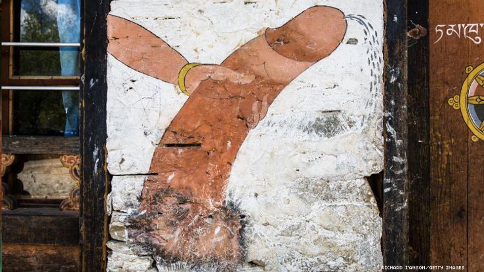 Hand on phallus illustration on house in Bhutan