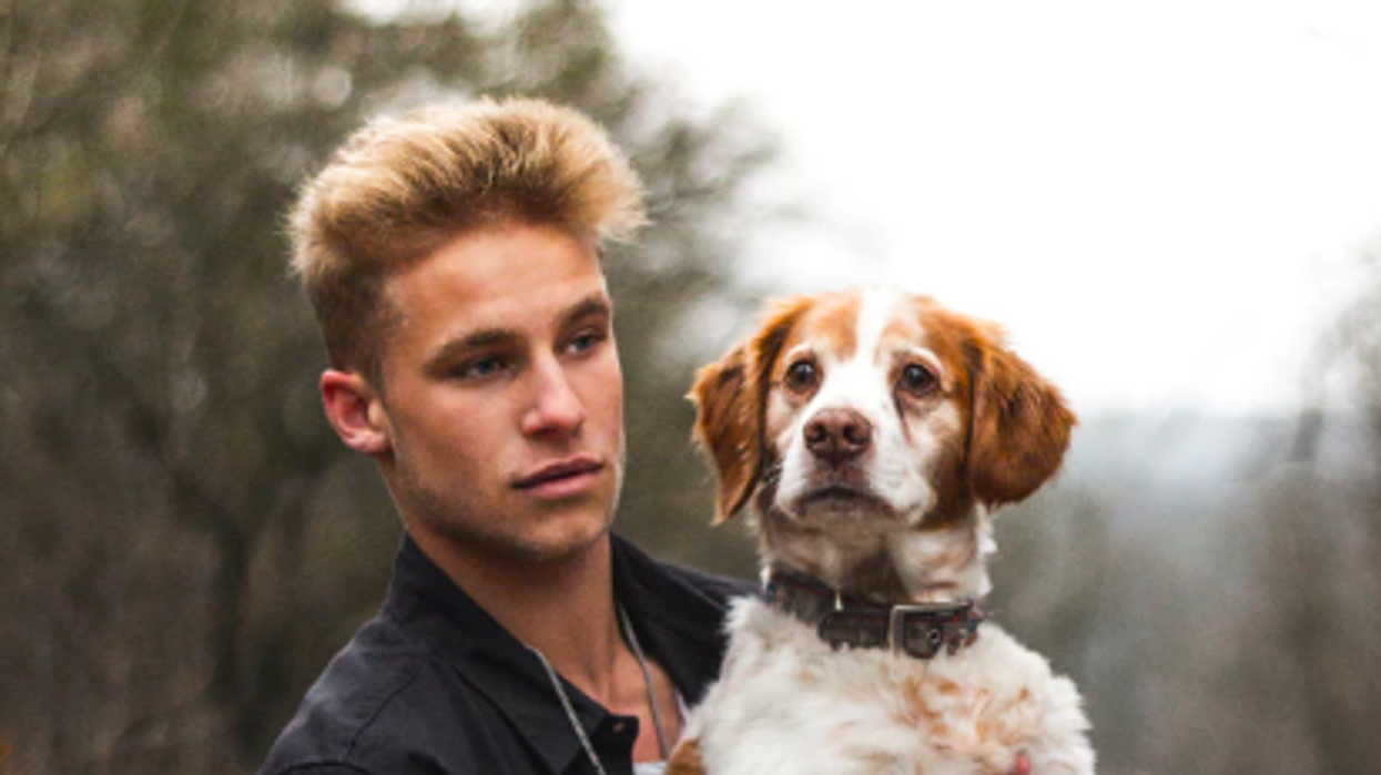 hot guy with a dog