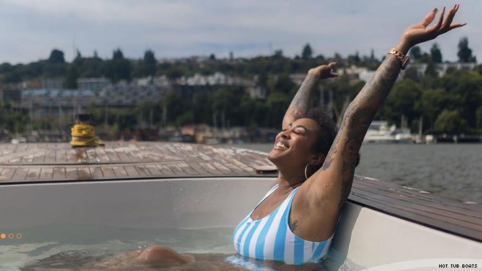 Hot Tub Boats Seattle black woman enjoys the hot tub boat