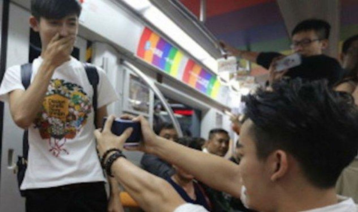 Watch: Gay Couple Gets Engaged On Beijing Subway, Crowd Cheers