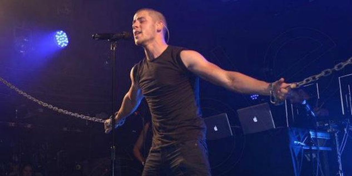 WATCH: Nick Jonas Chained Up at London's G-A-Y
