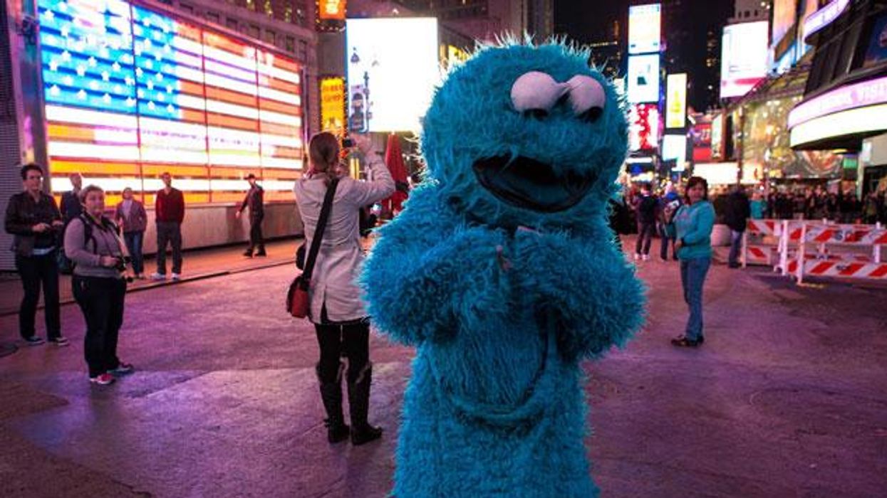 Cookie Monster Makes Tourists Cry in Times Square