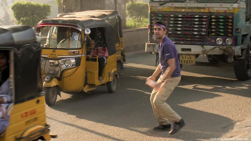 James in a busy street in India on The Amazing Race