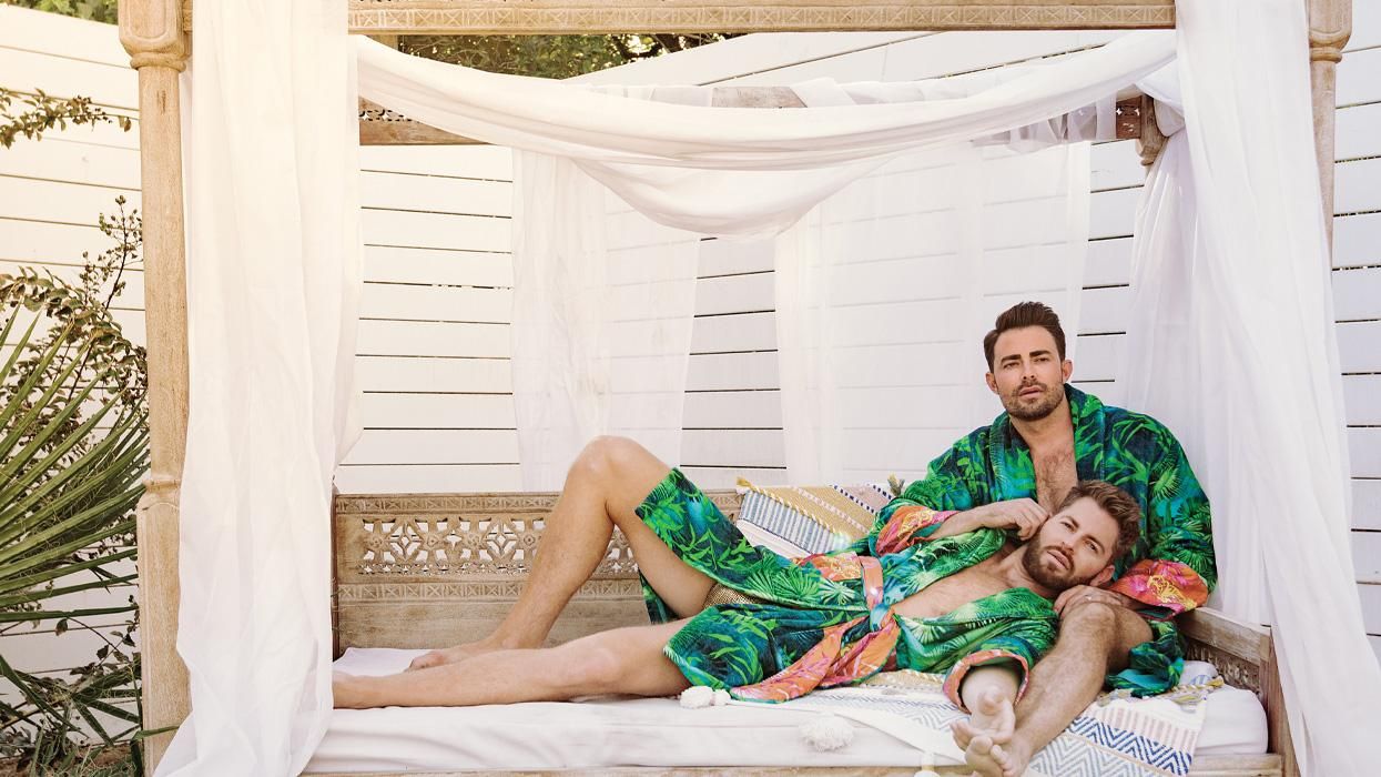 Jaymes Vaughan and Jonathan Bennett lounge in robes.