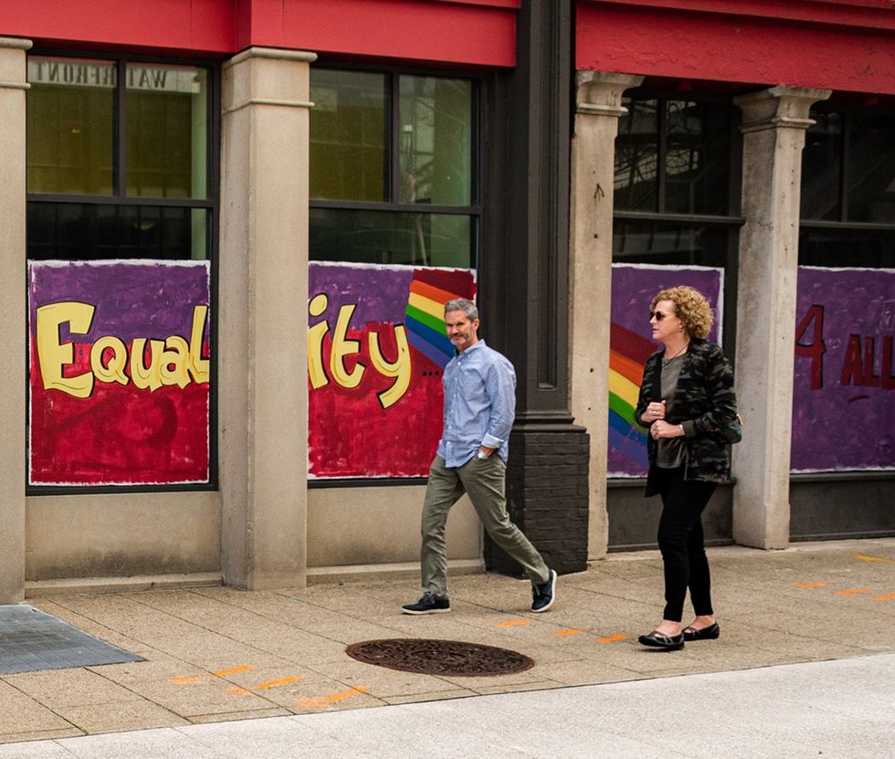 LGBTQ pride mural says Equality for all with rainbow in downtown Louisville Bourbon District
