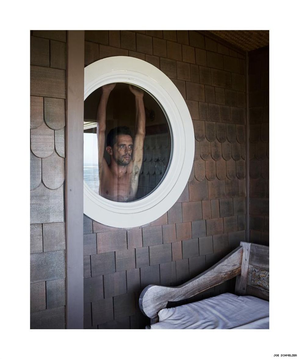 Life With Nick by Joe Schmelzer Nick in Hawaii looking through a round window