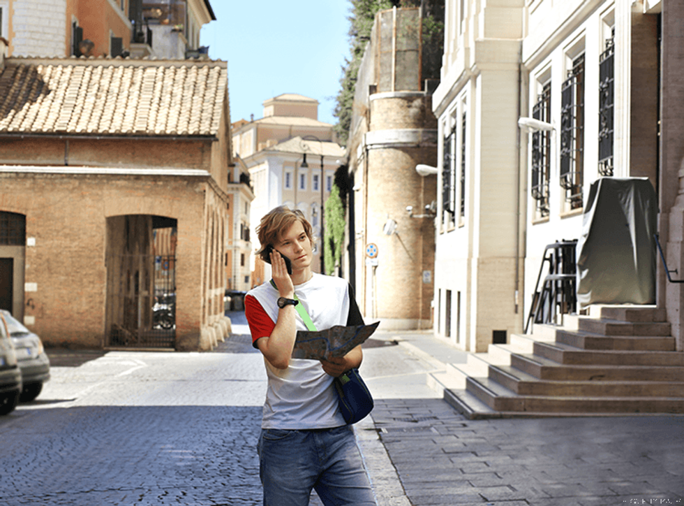 Man in Russia consults his map