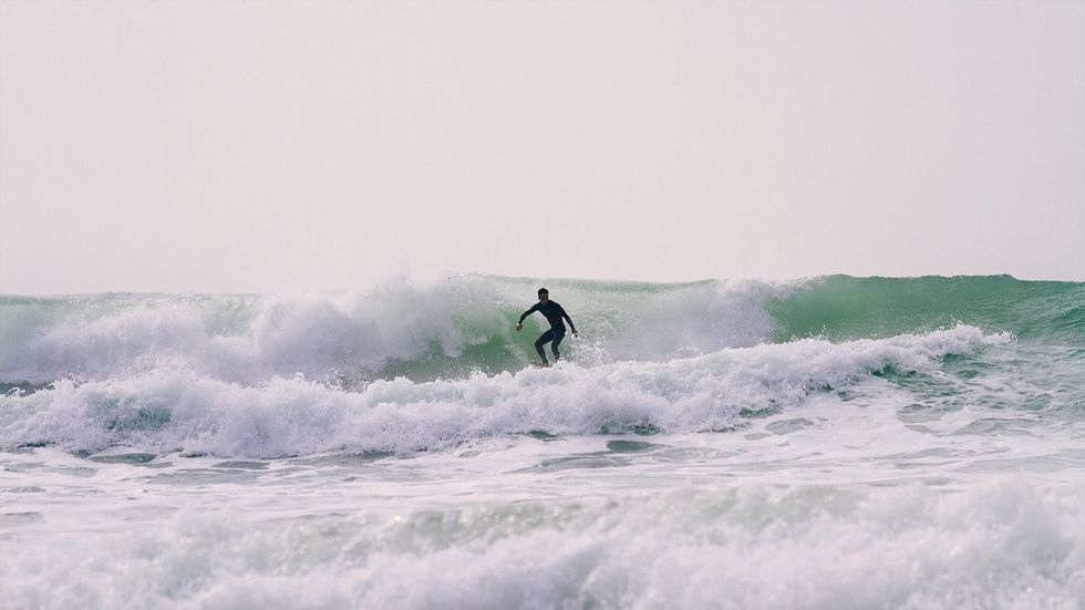 Man surfing at Riyue Bay