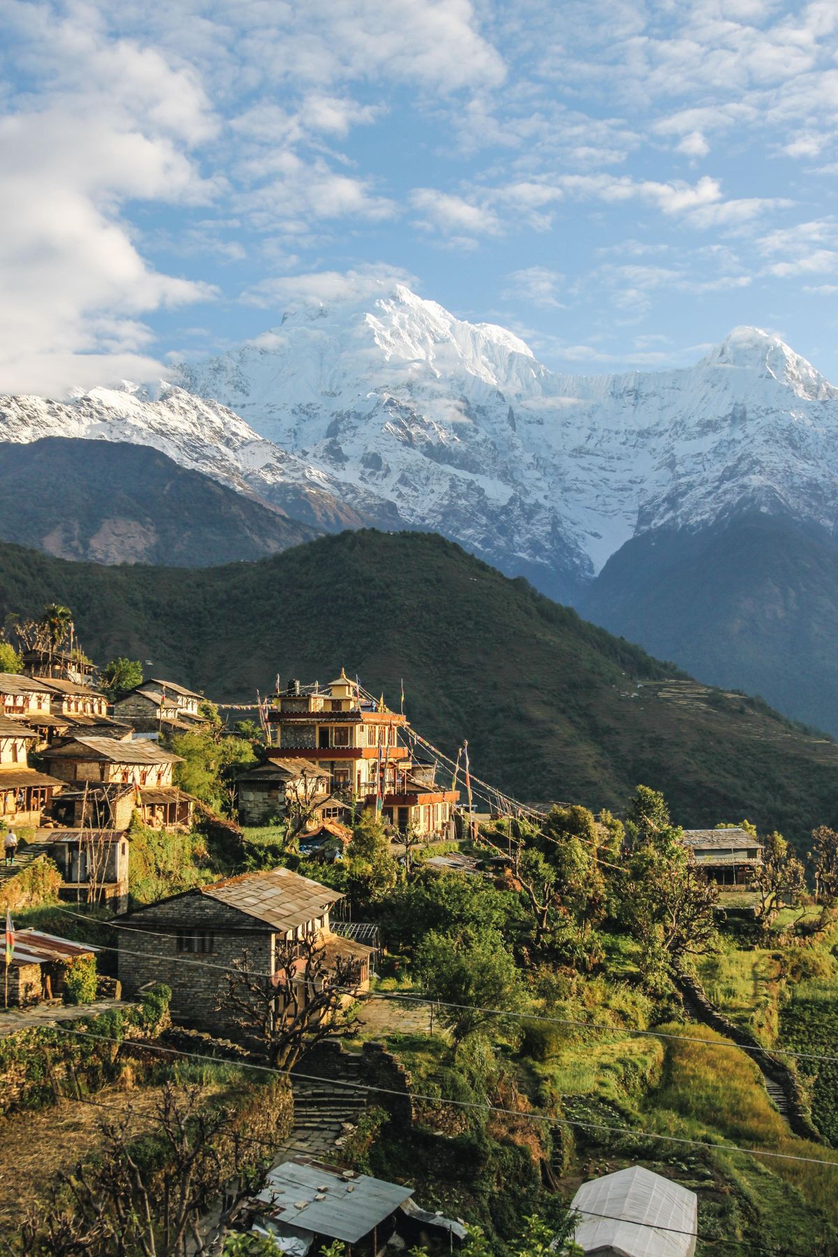 Nepal houses below mountain range