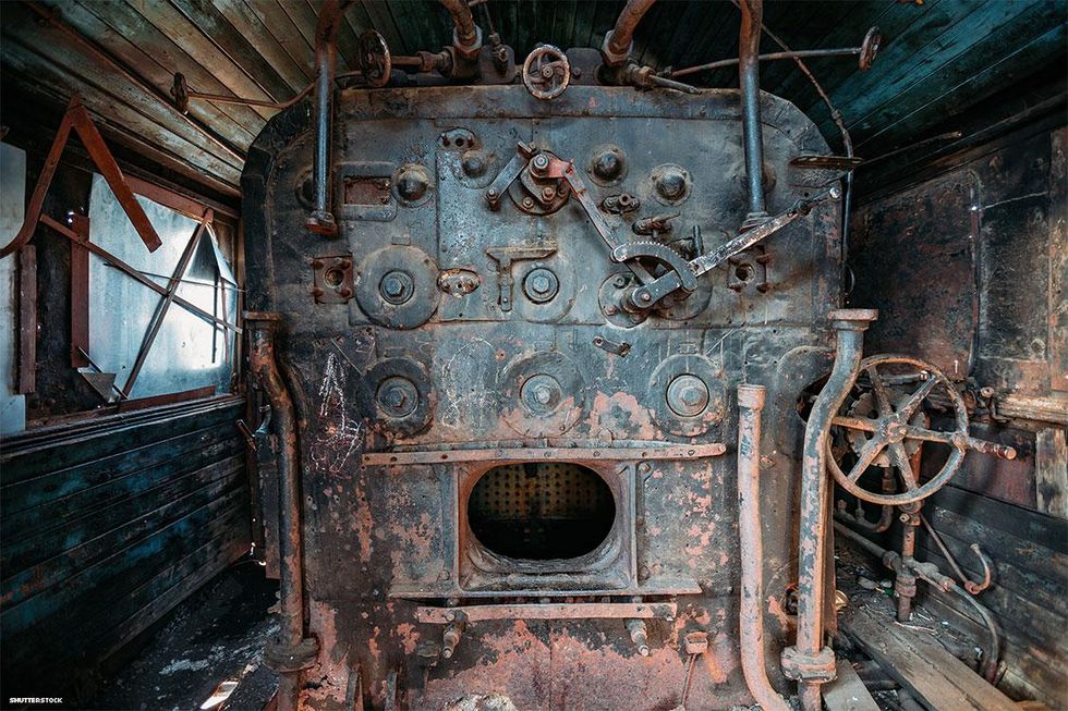 Old steam engine of abandoned steam locomotive