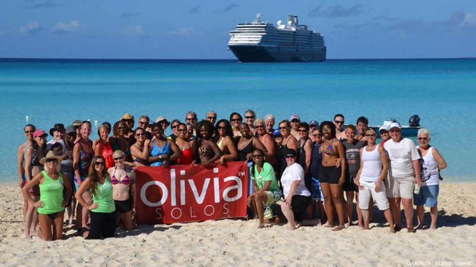 Olivia Solo group in front of ship