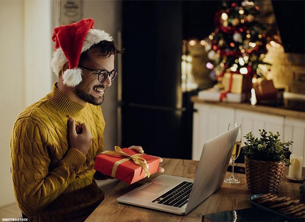 Opening present in front of computer