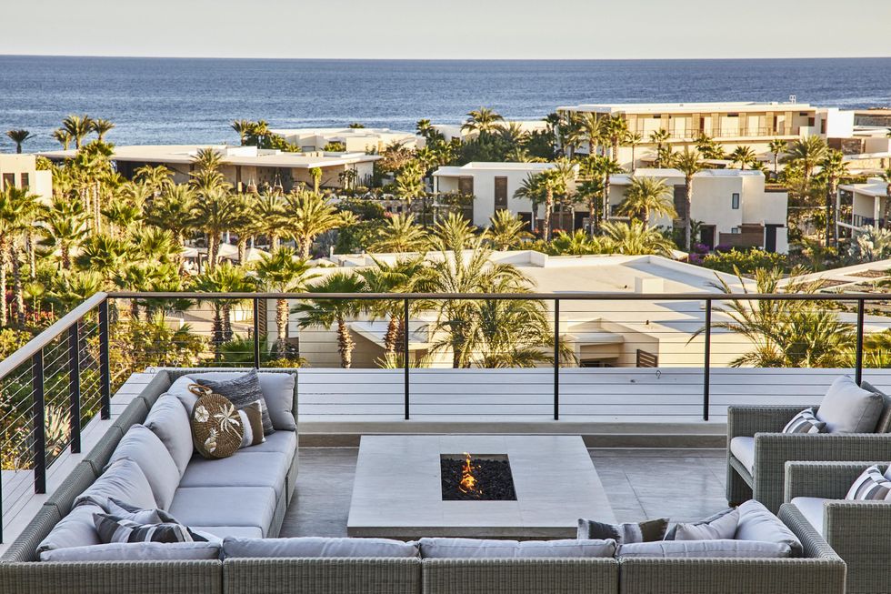Outdoor patio overlooking the ocean at Chileno Bay Resort