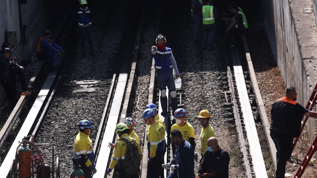 Rescue workers outside subway tunnel in Mexico City