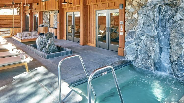 Rush Creek Spa Outdoor Lounge Featuring Granite Waterfall Hot Tub